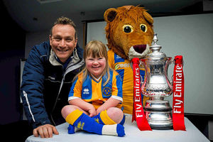 Lauren Baseley with Micky Mellon and club mascot Lenny the Lion