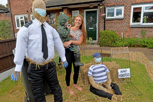 Hinstock is holding a scarecrow trail to keep kids entertained and raise money for good causes. The theme is 'lockdown heroes'. Pictured, Becky with Charlie age 3 with prison officers are the heroes