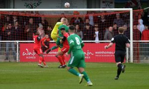 Whitchurch keeper Ellis Allen concedes a penalty