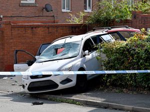 Supporting image for story: Four arrests made and three men taken to hospital after disorder in Bilston left car smashed up on pavement