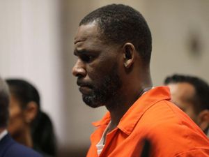 Supporting image for story: R Kelly taken off suicide watch in US jail following 30-year sentence
