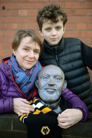 Sandra Squires with her son Lewis and the bust of Wolves manager Nuno