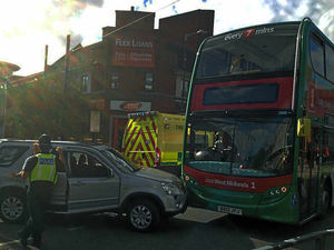 Supporting image for story: Bus and car collide outside Wolverhampton police station