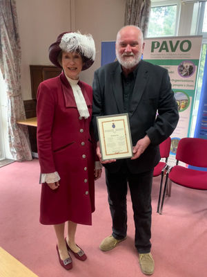 Cllr Nick Howells with the outgoing High Sheriff of Powys, Lady Kathryn Silk JP