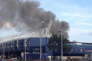 The thick plumes of smoke behind The Hawthorns. Pic: @DaveTheBaggie