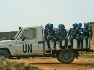 UN peacekeepers patrolling the streets of Juba, South Sudan, sitting on a van