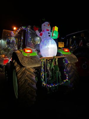 Another tractor which carried a snowman on its tour of the villages last year