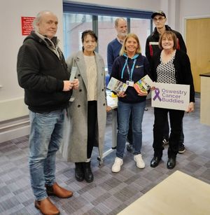Karen Roberts from Lingen Davies with group organiser Linda Lade and some of the group