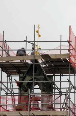 The cross at the top of the cathedral