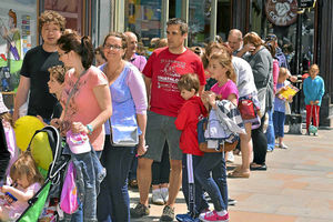 Long queues form outside the book shop as youngsters wait to meet author Terry Deary