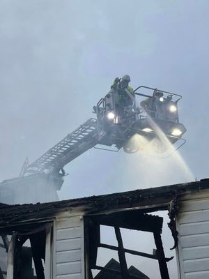 Firefighters battle the blaze