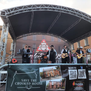 The Save the Crooked House (Let's Get it Rebuilt) held a one year anniversary rally in August 2024 but this year they are looking for answers.