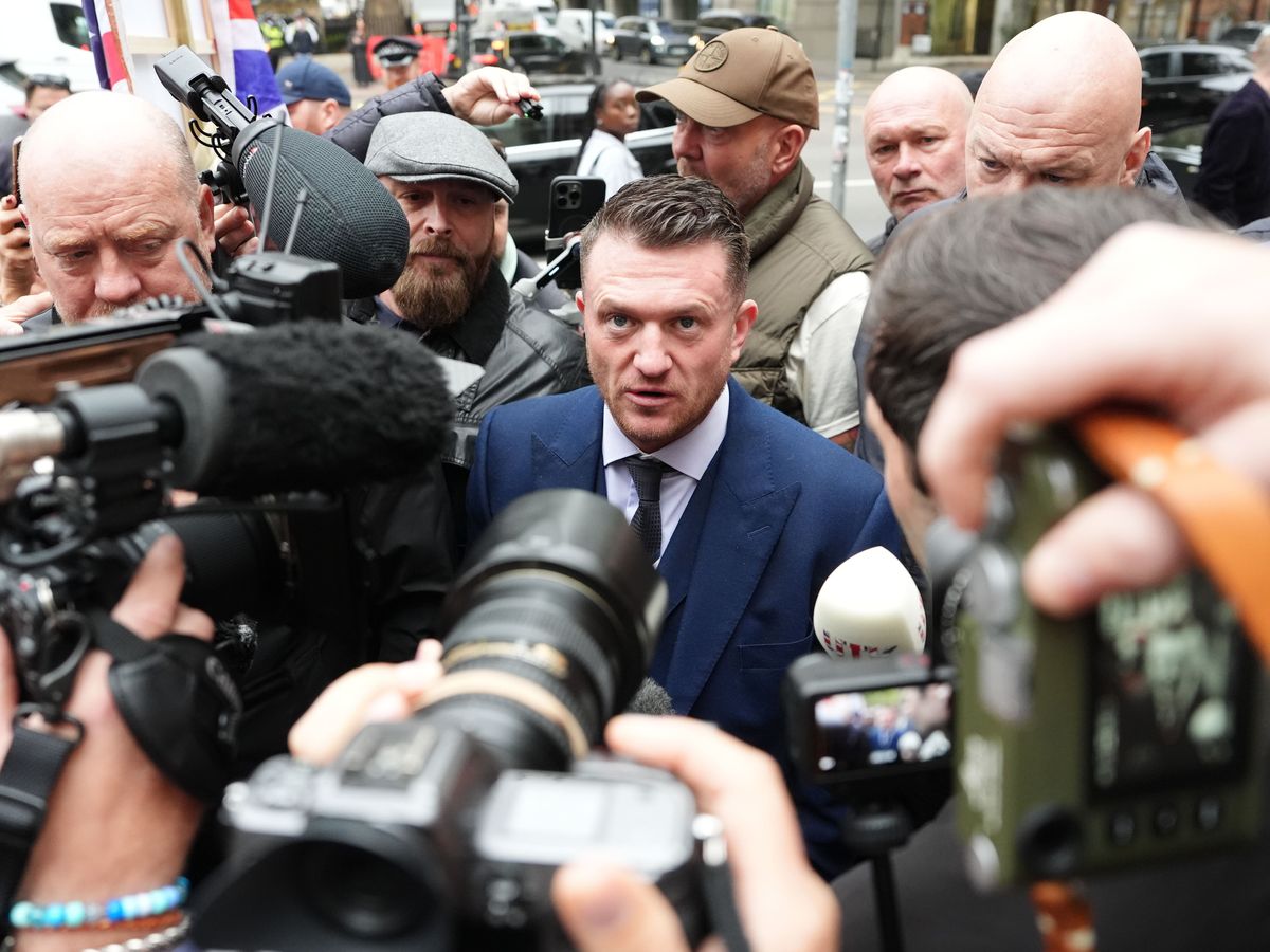 Tommy Robinson arrives in court for trial charged under Terrorism Act