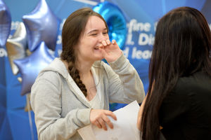 Caitlin Taylor opens her results at Beacon Hill Academy