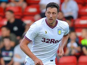 Supporting image for story: Aston Villa waiting on Tommy Elphick scan following ankle injury