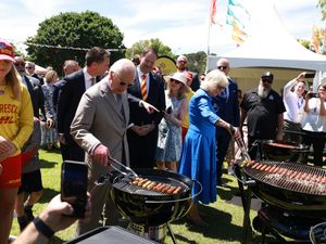 Supporting image for story: Charles and Camilla take charge of the tongs at Sydney ‘sausage sizzle’ barbecue