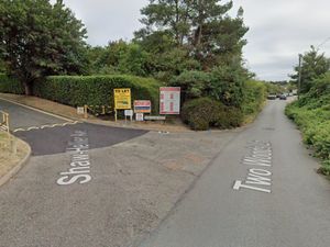 Supporting image for story: Emergency services swarm road near Merry Hill shopping centre after body of man found