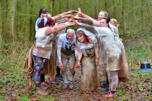Wedding couple Dave and Karen are helped along the course