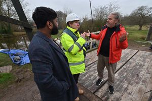 Paul Stowe (right) talking to Julie Sharman, Canal & River Trust chief operating officer at the scene of the collapse. Photo: Steve Leath