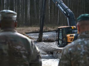 Supporting image for story: US vehicle missing in Lithuania pulled from swamp but fate of soldiers unknown