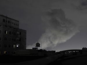 Smoke rises from a location reportedly struck by US air strikes in Sanaa