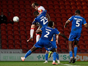 Supporting image for story: 'Old-fashioned centre-half' - what can Shrewsbury expect from new arrival Tom Anderson?