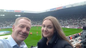 Charlotte and her father at a Newcastle United match