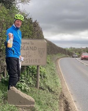 Another sign is about to receive the attention of John's mop