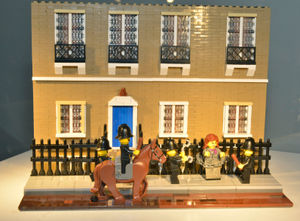 Suffragette Emmeline Pankhurst chained to the fence