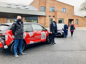 Supporting image for story: Car firm loans electric vehicles to county charity