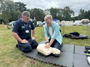 Josh Newberry MP learning CPR skills