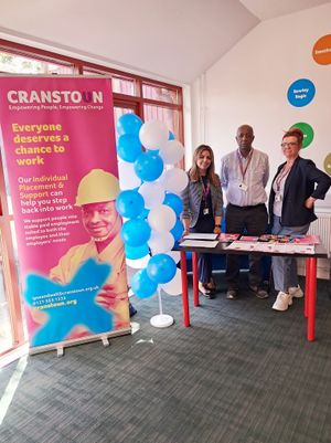 The IPS Sandwell team pose at their one-year celebration event