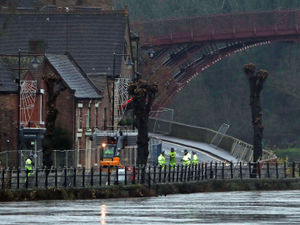 Supporting image for story: Flood barriers up in Ironbridge and Shrewsbury as heavy rain pours until Christmas Eve