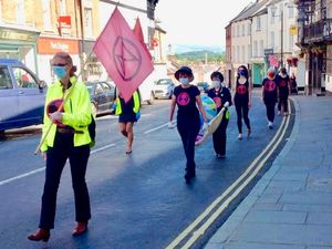 Supporting image for story: Rebels march to highlight ‘inadequate’ climate targets