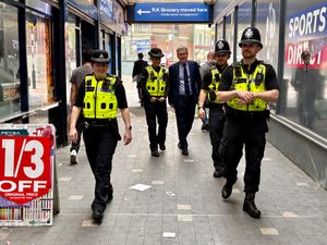 West Midlands Police and Crime Commissioner Simon Foster with officers from Operation Prosper in Walsall. PIC: Gurdip Thandi LDR