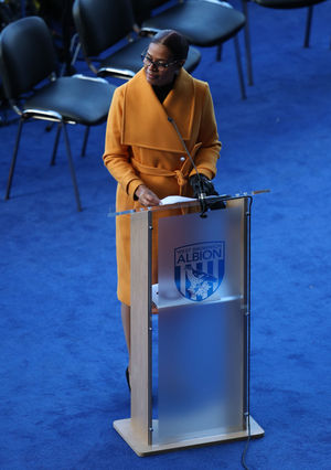 Julia Regis fights back the tears