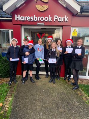 Tenbury High Ormiston Academy delivering Christmas cards to Haresbrook Park Care Home