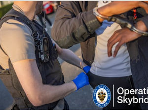 The driver being arrested after police found drugs and a stolen car key on him as well as a balaclava and blade. 