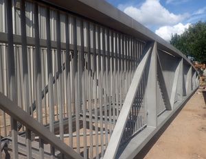 The refurbished bridge awaiting re-painting ahead of being put back in place.