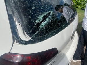 Supporting image for story: Residents in fear after masked thugs attack homes and cars with petrol bomb and machetes