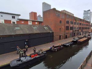 Supporting image for story: Lights, canals, action: Peaky Blinders filming takes over city centre waterways