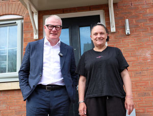 Janet Williams with Richard Parker outside her new home