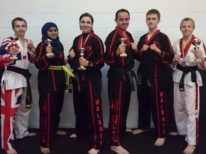 Supporting image for story: Fighters bag a magnificent seven medals