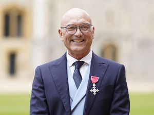 Gregg Wallace smiling after receiving an honour