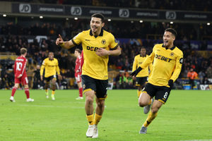 The matchwinner! Andre peels away in celebration (Photo by David Rogers/Getty Images)