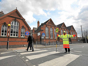 Supporting image for story: Fifteen lollipop men and women being taken on