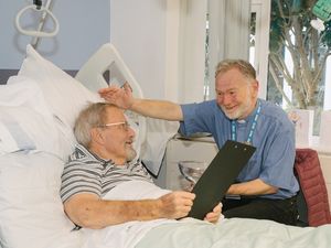 Supporting image for story: 'It felt the right time': Retired Telford antiques dealer, 82, baptised in Shropshire hospital bed after major surgery