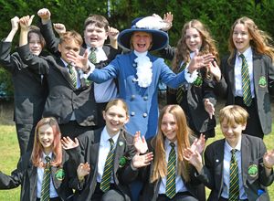 Jane is pictured with children from Idsall School in Shifnal