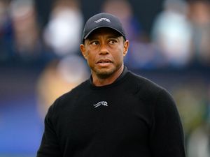 Tiger Woods wearing black