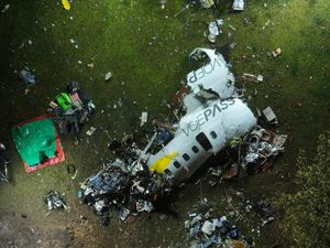 Supporting image for story: Brazilian authorities probe cause of plane crash that left 62 dead
